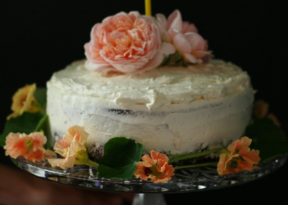 A Birthday Cake with roses and nasturtiums
